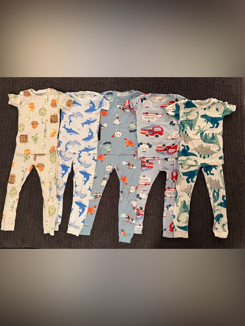Five pairs of 5T Carter’s Pajamas-never worn
